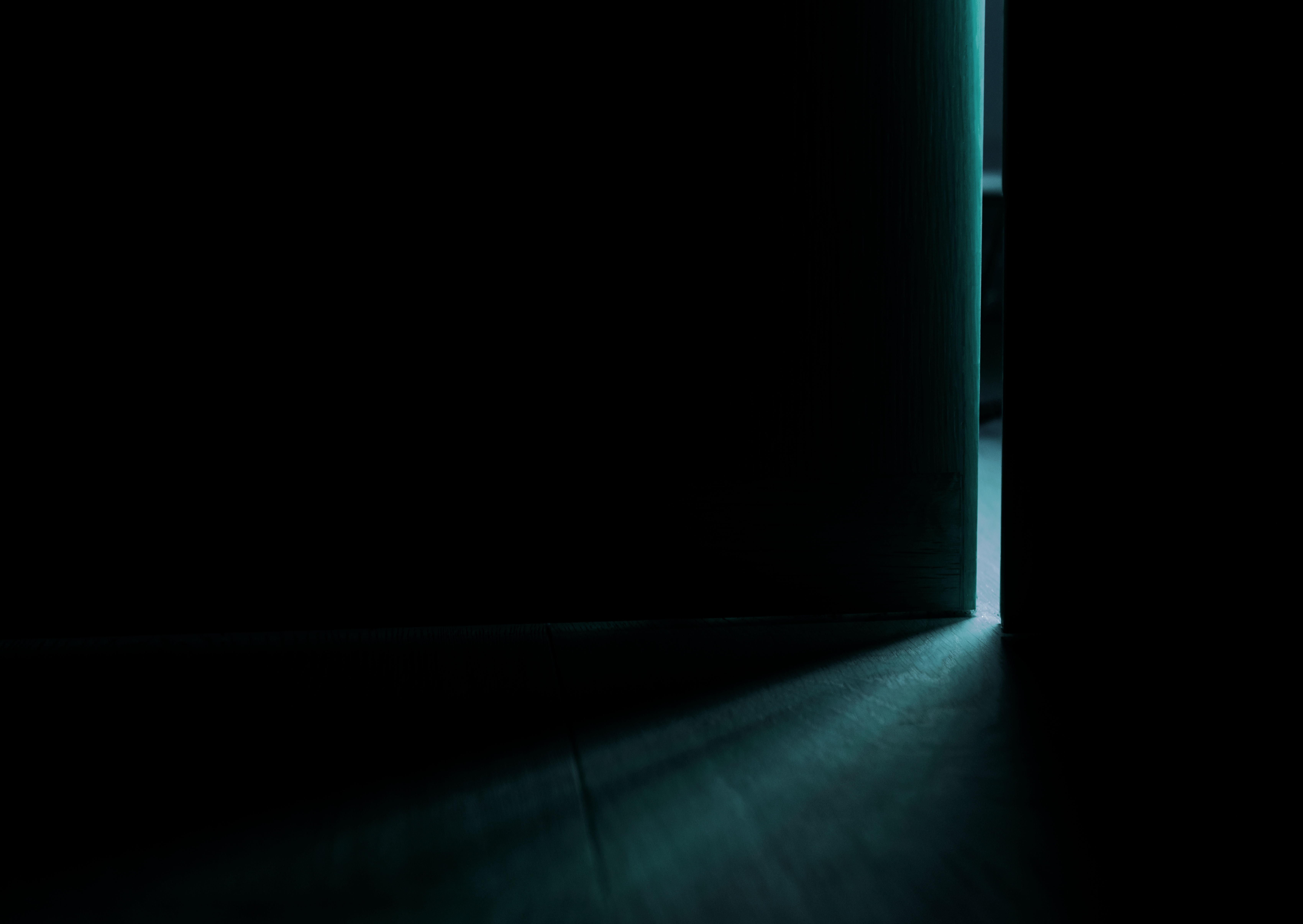 a cracked door in the dark