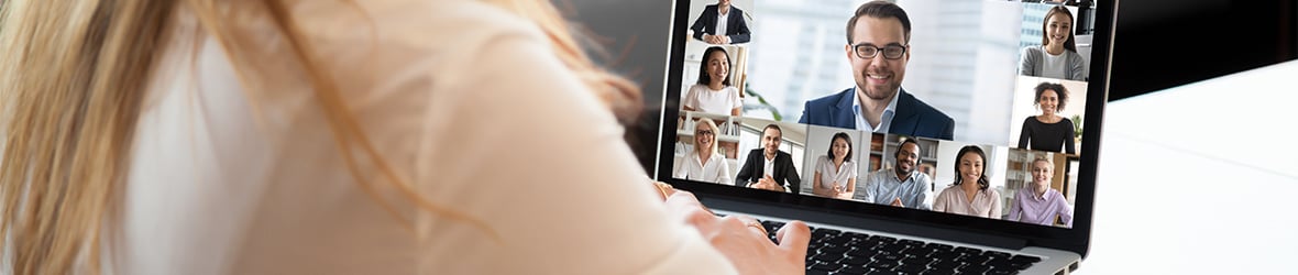 Business professional participating in a unified communications video conference using UCaaS platform