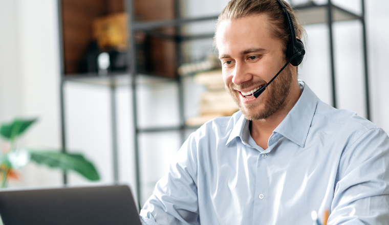 man on headset in office